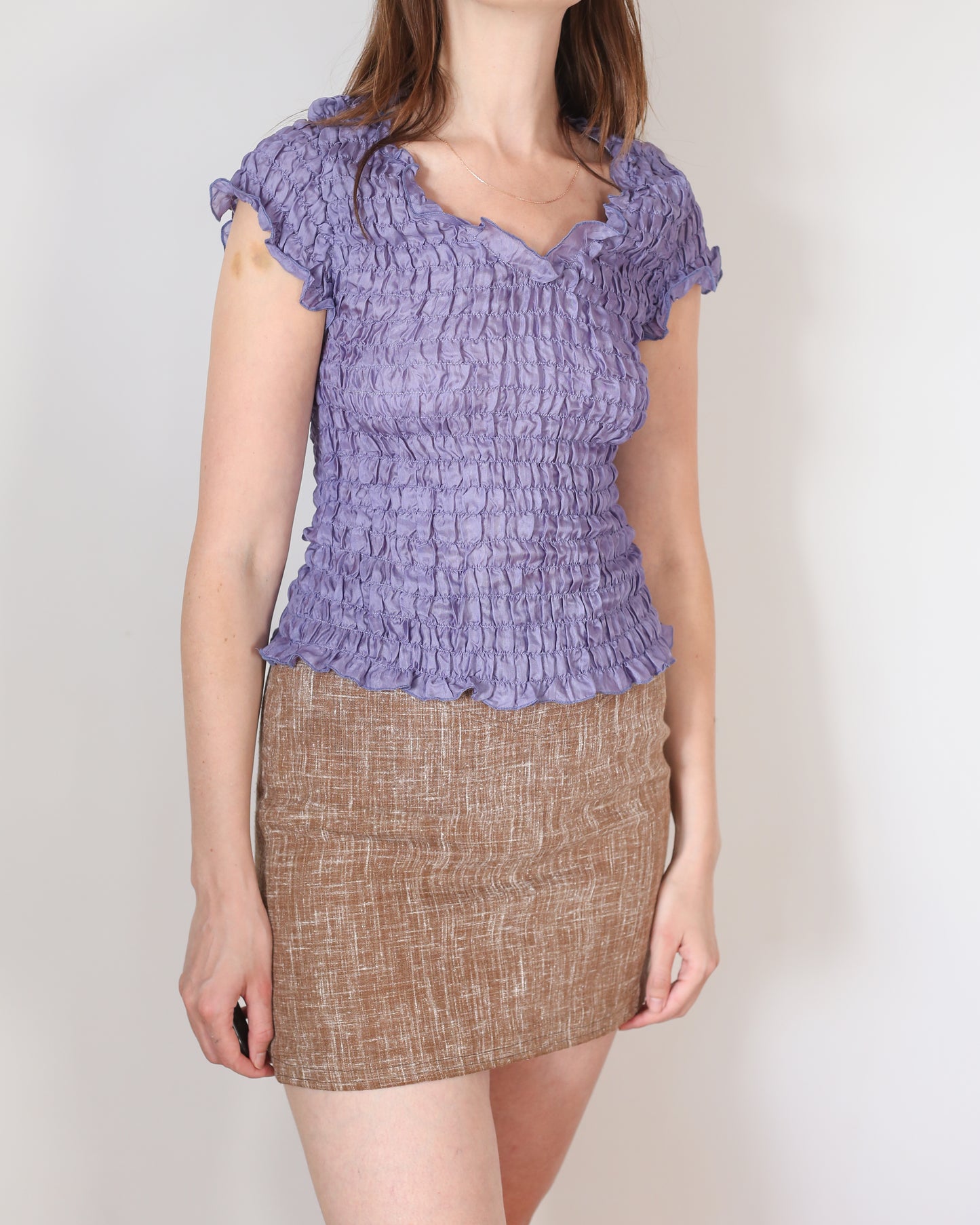 purple silk ruffle top